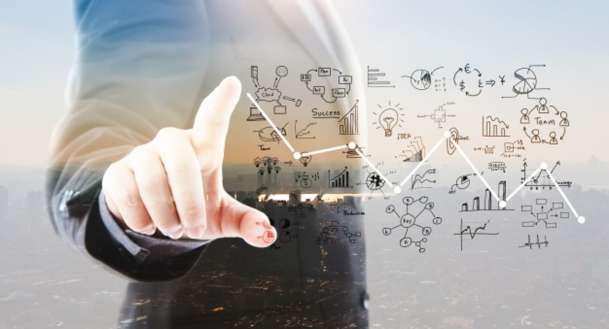 We need to see results! Business man pointing to graphs and symbols
