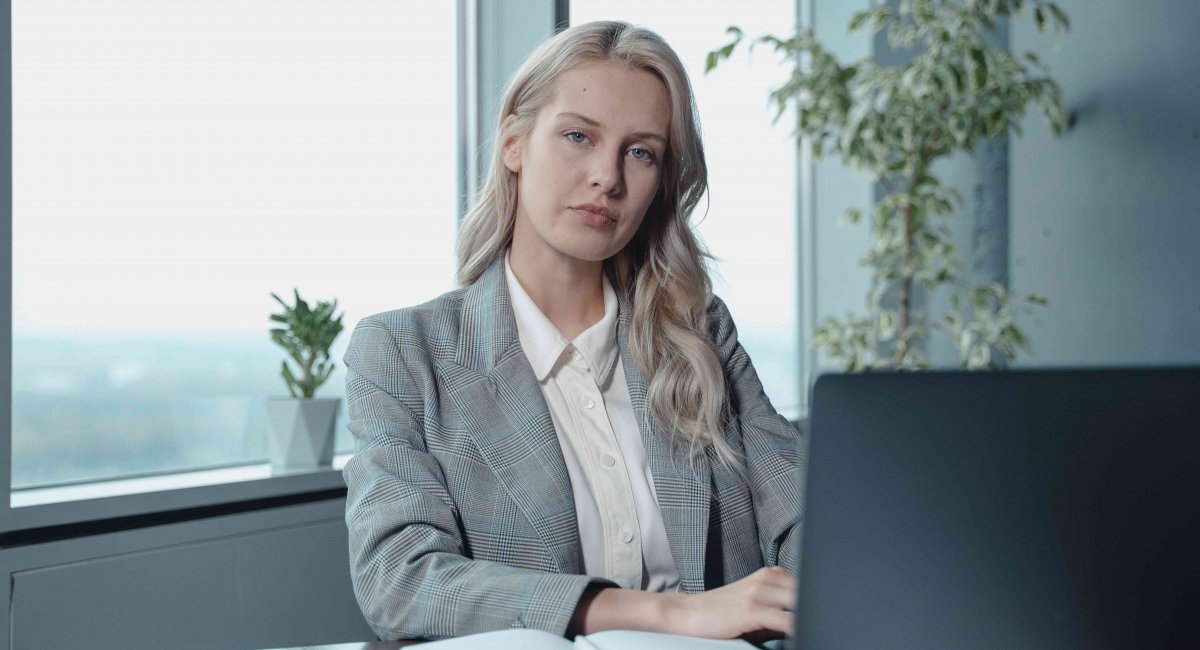 Next question... Businesswoman looking unfriendly.