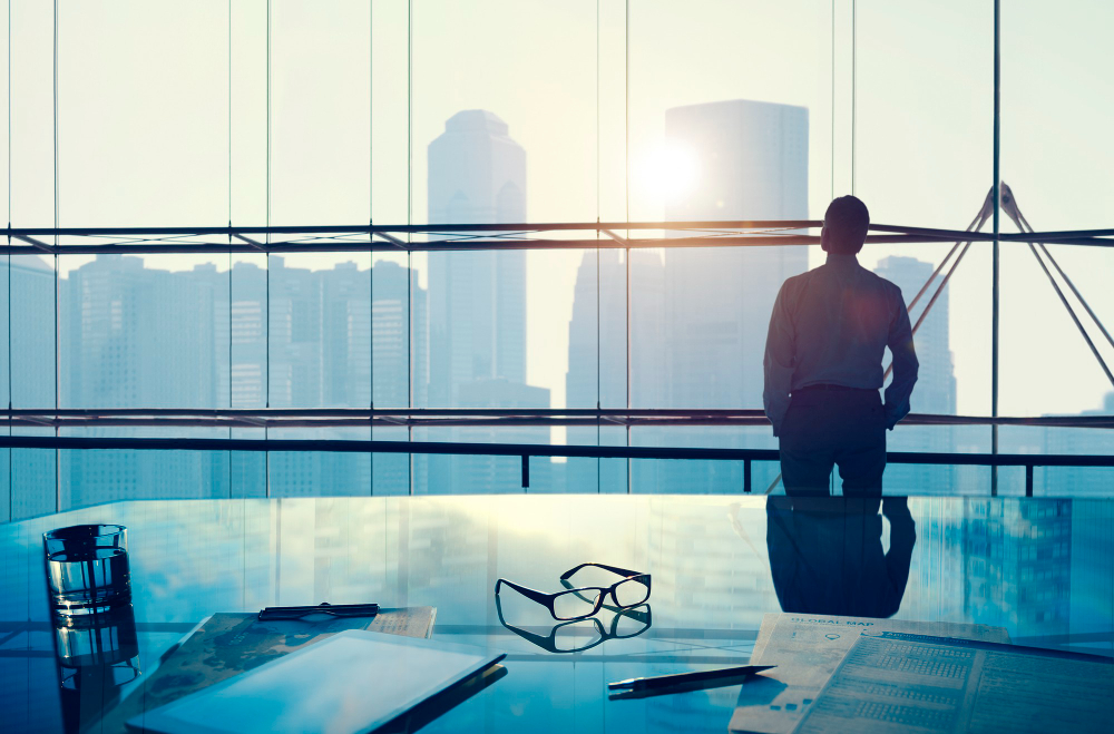 A businessman in a big office