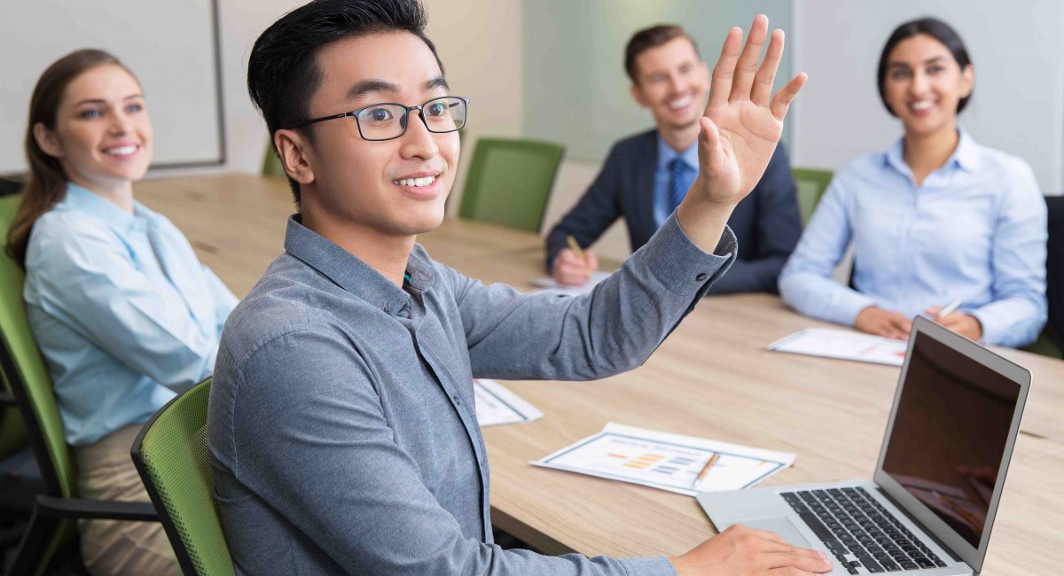 classroom answer raise hand young man Asian