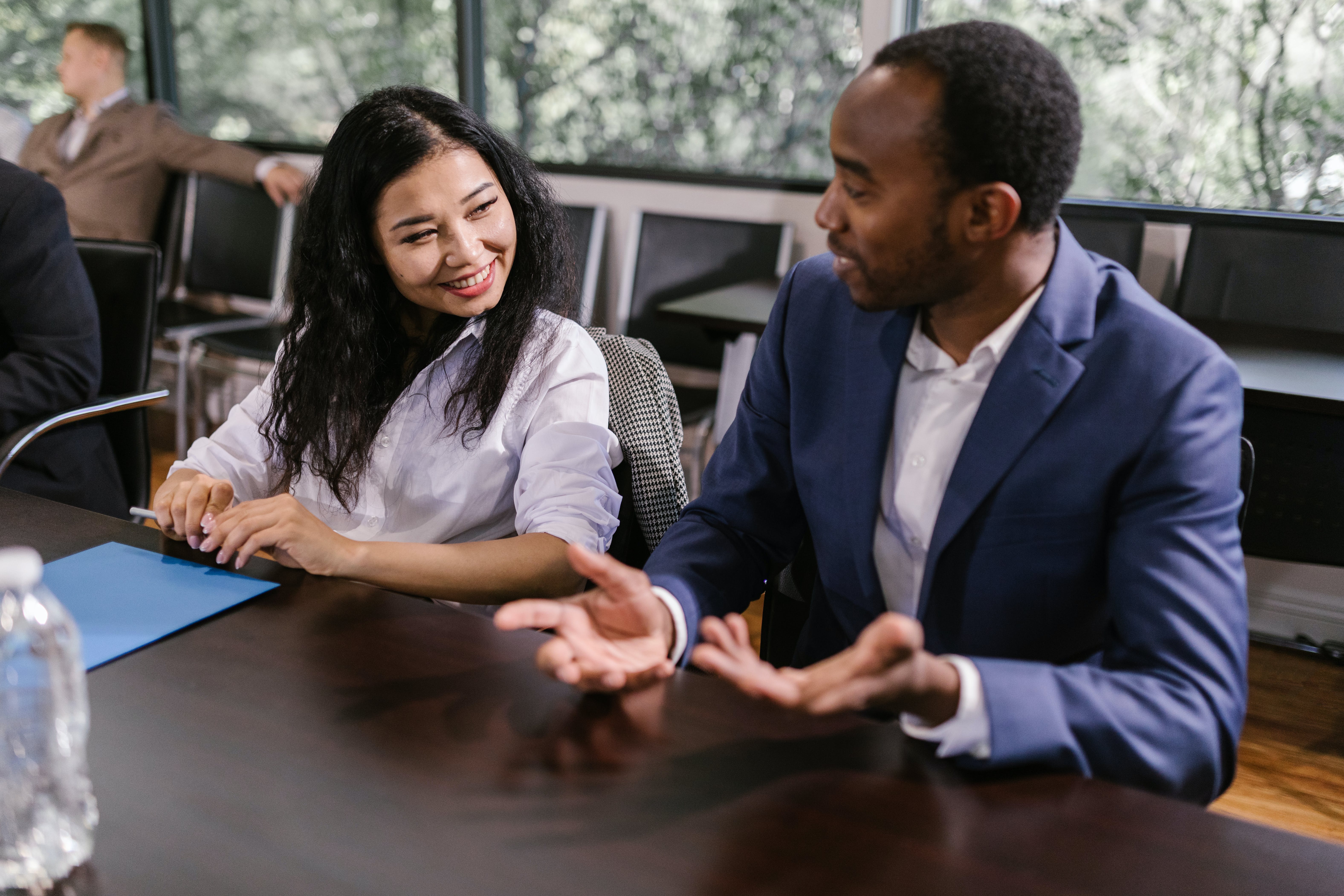 Colleagues talking with each other