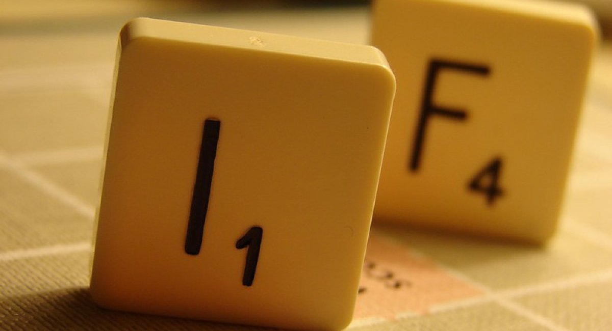 Scrabble tiles I and F